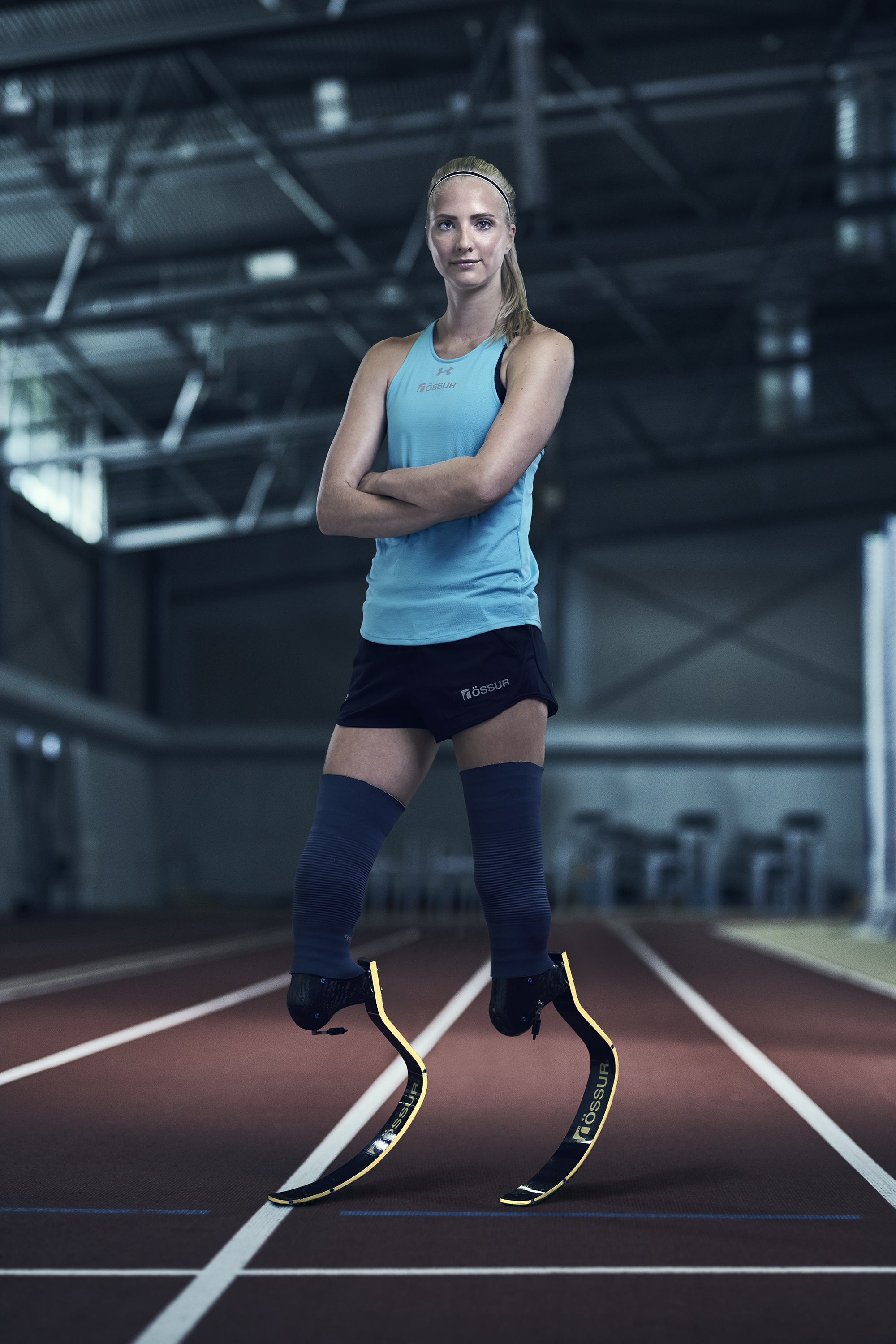 Paralympic athlete Fleur Jong in training with running prosthetics